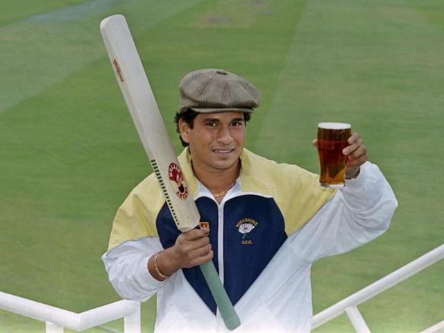 Sachin Tendulkar arrives at the Oval in London with a pint of English beer, on April 28, 1992, before making his debut for the Yorshire team on April 30. (AFP)