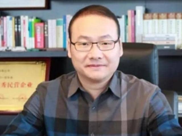 Yang Weiguo, allegedly on the run with $150 million of investors’ money from a city in eastern China, appeared in an online video on Monday. (Picture courtesy: Twitter) Yang Weiguo, allegedly on the run with $150 million of investors’ money from a city in eastern China, appeared in an online video on Monday. (Picture courtesy: Twitter)