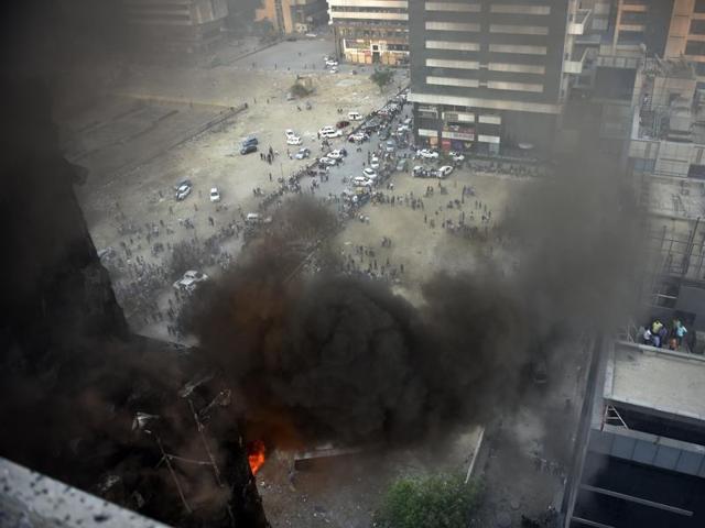 A fire broke out in a building in Netaji Subhash Place on Sunday.(Ravi Choudhary/HT)