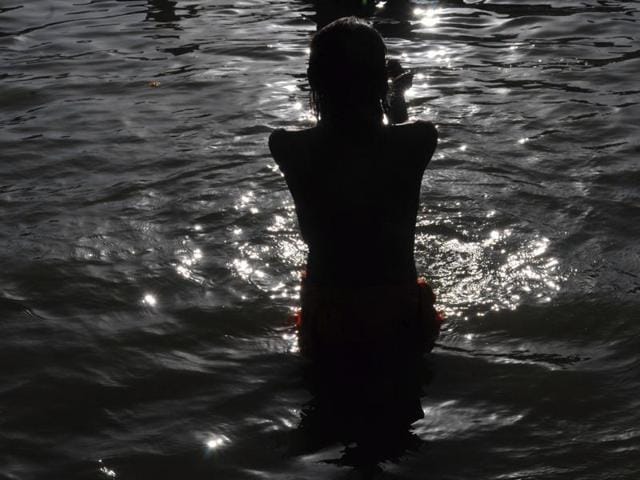 Naga sadhus and others take a holy dip in Kshipra in Ujjain. (HT file) Naga sadhus and others take a holy dip in Kshipra in Ujjain. (HT file)