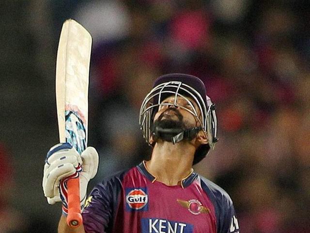 Ajinkya Rahane raises his bat after completing his half-century. (PTi) Ajinkya Rahane raises his bat after completing his half-century. (PTi)