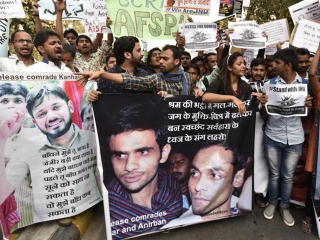 Demonstrators shout slogans as they hold placards of Kanhaiya Kumar, Umar Khalid and Anirban Bhattacharya who are facing charges of sedition, in New Delhi. (Virendra Singh Gosain/HT File Photo) Demonstrators shout slogans as they hold placards of Kanhaiya Kumar, Umar Khalid and Anirban Bhattacharya who are facing charges of sedition, in New Delhi. (Virendra Singh Gosain/HT File Photo)