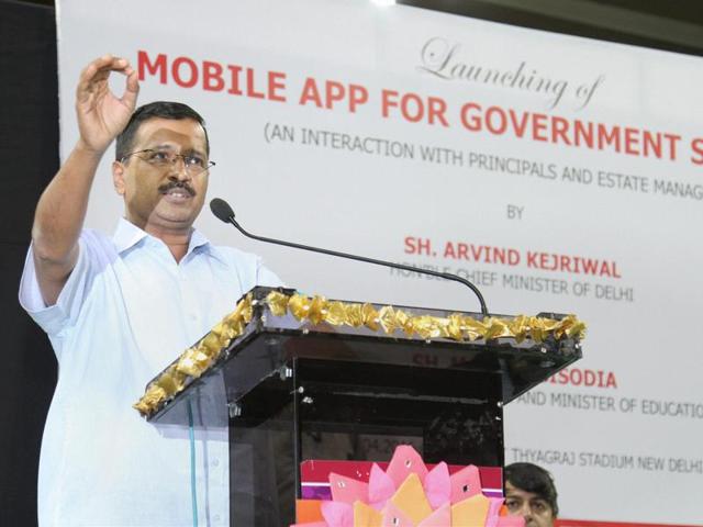 Delhi CM Arvind Kejriwal and deputy chief minister Manish Sisodia at the launch of a mobile application for government schools, at Thyagraj Stadium in New Delhi.(PTI Photo)