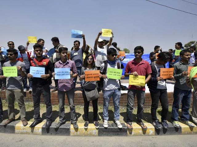 Nepali citizens hold protest against the government in Kathmandu accusing it of apathy towards the earthquake victims. (Raj K Raj/Hindustan Times) 
