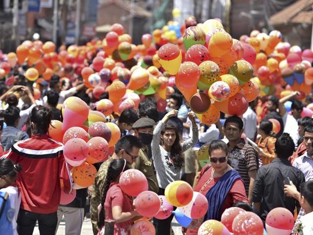 Nepalese people gather at Darbar Square in Kathmandu to mark the first anniversary of the 2015 earthquake. (Raj K Raj/Hindustan Times) 