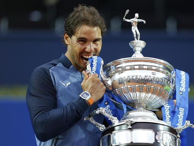 Spain's Rafael Nadal poses for a photo with the trophy, next to Japan’s Kei Nishikori, after winning the Barcelona Open. (AP) Spain's Rafael Nadal poses for a photo with the trophy, next to Japan’s Kei Nishikori, after winning the Barcelona Open. (AP)