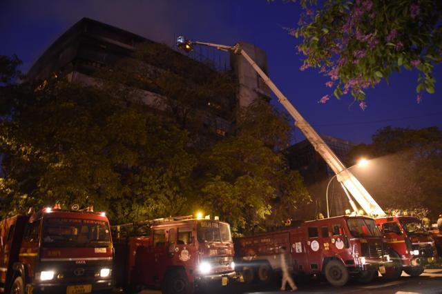 The fire started in the early hours of Tuesday at the FICCI building. As many as 25 fire tenders were pressed into service to contain the flames. (Arvind Yadav/HT Photo) The fire started in the early hours of Tuesday at the FICCI building. As many as 25 fire tenders were pressed into service to contain the flames. (Arvind Yadav/HT Photo)