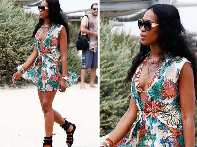 Strappy fringed sandals and a mini-dress: What’s not to like in Naomi Campbell’s perfect beach look?
