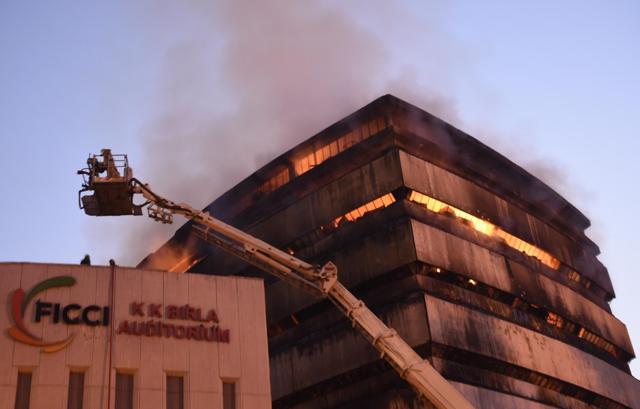 The fire was reported on the top floor of the auditorium which was being renovated, and later spread to other floors, the fire official said. (Arvind Yadav/ HT Photo) The fire was reported on the top floor of the auditorium which was being renovated, and later spread to other floors, the fire official said. (Arvind Yadav/ HT Photo)