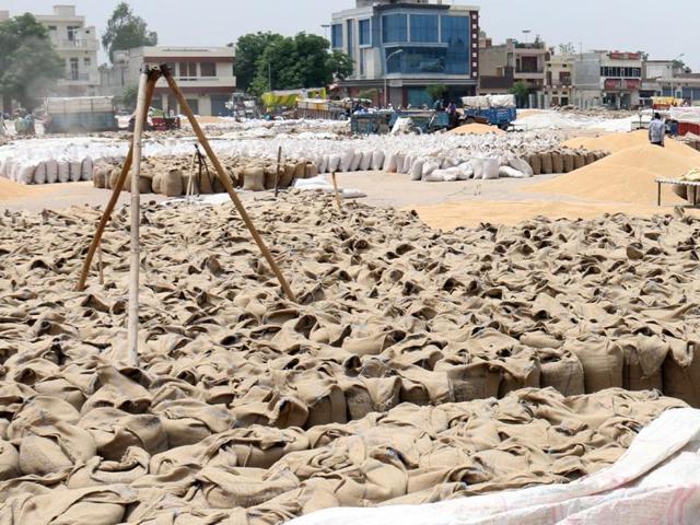 Unlifted wheat stock at the grain market in Bathinda on Monday. (Sanjeev Kumar/HT) Unlifted wheat stock at the grain market in Bathinda on Monday. (Sanjeev Kumar/HT)