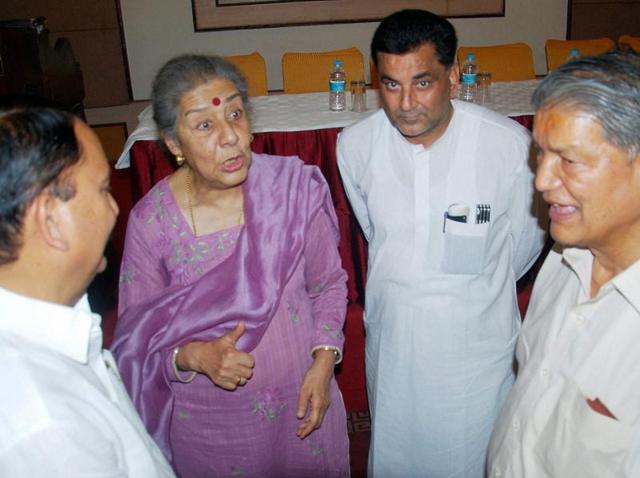 Former Uttarakhand CM Harish Rawat with state Congress in-charge Ambika Soni and Sanjay Kapoor (2R) during a meeting in Dehradun on Friday. (PTI) Former Uttarakhand CM Harish Rawat with state Congress in-charge Ambika Soni and Sanjay Kapoor (2R) during a meeting in Dehradun on Friday. (PTI)