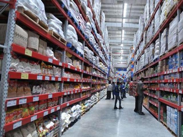 A file picture taken on September 26, 2012 shows shoppers browsing through the products of a newly opened Bharti Wal-Mart Best Price Modern wholesale store in Hyderabad. (AFP) A file picture taken on September 26, 2012 shows shoppers browsing through the products of a newly opened Bharti Wal-Mart Best Price Modern wholesale store in Hyderabad. (AFP)