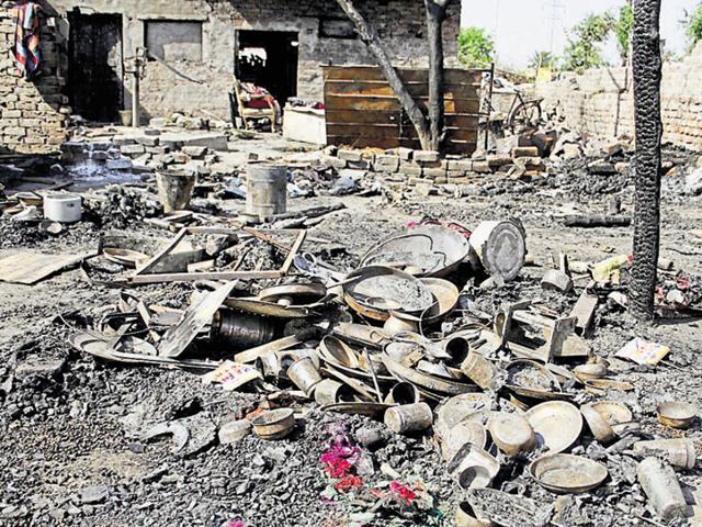 Gutted articles at the slums near Ladhowal slum in Ludhiana on Monday. (HT Photo) Gutted articles at the slums near Ladhowal slum in Ludhiana on Monday. (HT Photo)