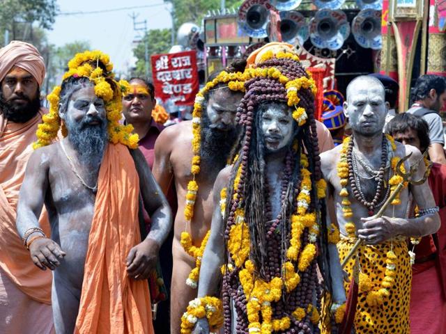 A large number of devotees gather to take bath in holy river Kshipra in Ujjain. (PTI) A large number of devotees gather to take bath in holy river Kshipra in Ujjain. (PTI)