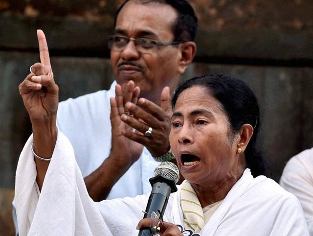 West Bengal chief minister Mamata Banerjee gestures during her election campaign in Kolkata on Monday. (PTI) West Bengal chief minister Mamata Banerjee gestures during her election campaign in Kolkata on Monday. (PTI)
