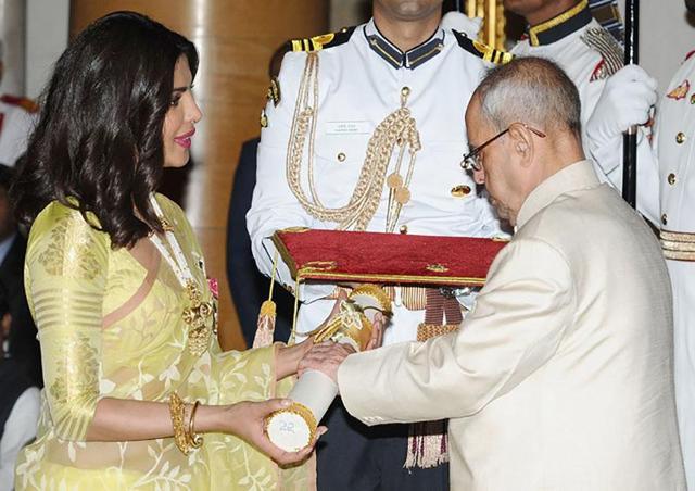 Pranab Mukherjee presents The Padma Shri Award to Bollywood actress Priyanka Chopra during a Civil Investiture Ceremony at Rashtrapati Bhavan, in New Delhi. (AFP) Pranab Mukherjee presents The Padma Shri Award to Bollywood actress Priyanka Chopra during a Civil Investiture Ceremony at Rashtrapati Bhavan, in New Delhi. (AFP)
