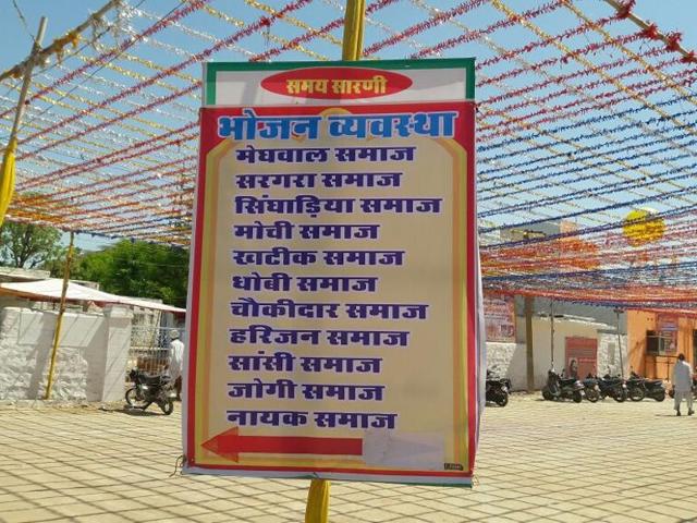 Dalit rights campaigners alleged that signboards were placed at the temple directing people to different counters based on their caste to pick up prasad and food. (HT Photo) Dalit rights campaigners alleged that signboards were placed at the temple directing people to different counters based on their caste to pick up prasad and food. (HT Photo)