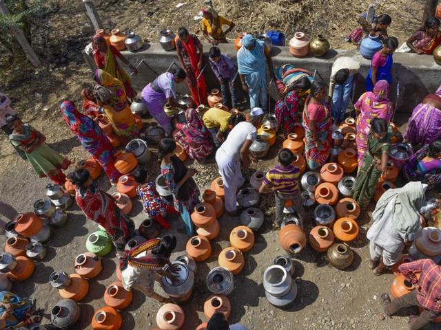 Drought, combined with a searing heatwave, has ensured that these tankers are a crucial lifeline for villagers who are completely dependent on them. (Satish Bate/Hindustan Times)