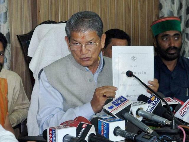 Former Uttarakhand chief minister Harish Rawat ‘s government was sent out of power after nine Congress MLAs rebelled to put the ruling Congress in minority. (PTI file photo) Former Uttarakhand chief minister Harish Rawat ‘s government was sent out of power after nine Congress MLAs rebelled to put the ruling Congress in minority. (PTI file photo)