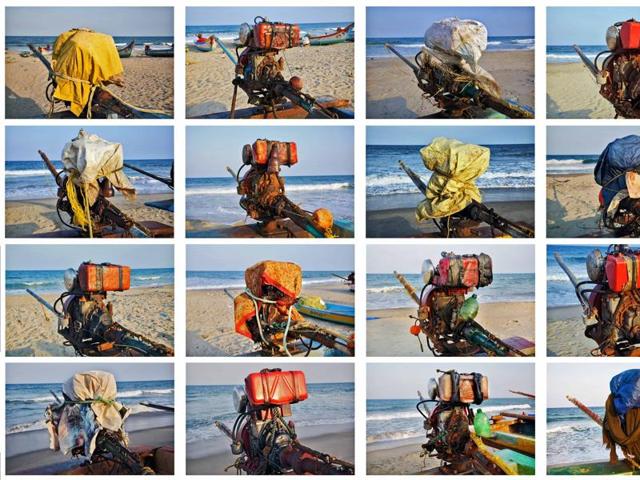 Engines, 20 Km: Engines tied to boats and covered with plastic sheets. While the bigger fishermen are able to afford powerful diesel engines, the smaller ones have to be content with smaller engines and nets. (Ravi Agarwal) Engines, 20 Km: Engines tied to boats and covered with plastic sheets. While the bigger fishermen are able to afford powerful diesel engines, the smaller ones have to be content with smaller engines and nets. (Ravi Agarwal)