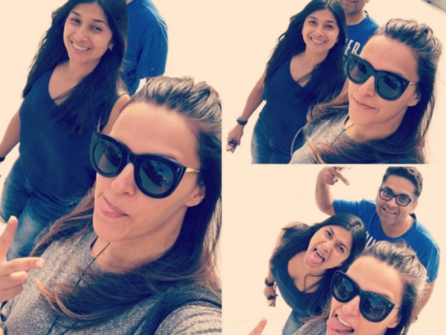 A funny face contest is on against Neha and her friends... all part of the beach life. (Instagram) 