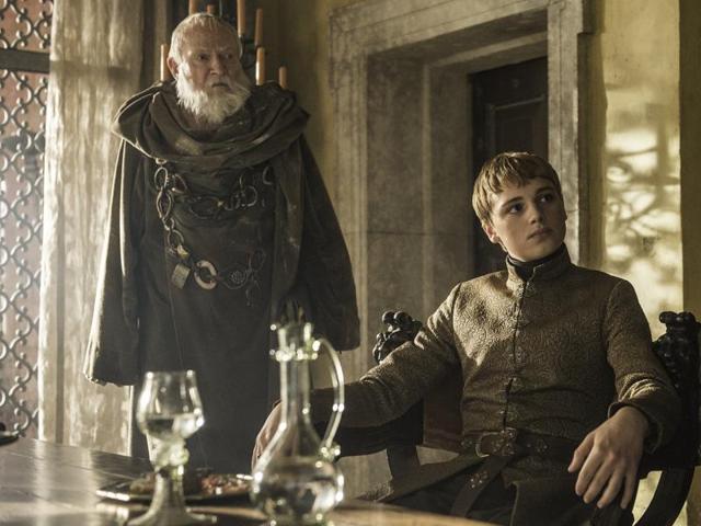 Look at him, chilling on his thrones, sipping wine while his pretty wife rots in a cell. (HBO)