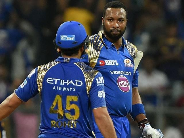 Mumbai Indians batsman Kieron Pollard celebrates with captain Rohit Sharma after winning the match. (AFP Photo) Mumbai Indians batsman Kieron Pollard celebrates with captain Rohit Sharma after winning the match. (AFP Photo)