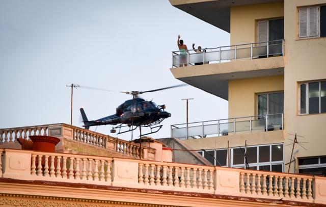 Cubans look at one of the helicopters from Universal Studios of Hollywood used during the shooting of Fast & Furious 8 in Havana. (AFP) Cubans look at one of the helicopters from Universal Studios of Hollywood used during the shooting of Fast & Furious 8 in Havana. (AFP)
