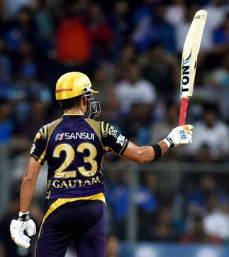 Kolkata Knight riders batsman Gautam Gambhir celebrates his half century. (PTI Photo)
