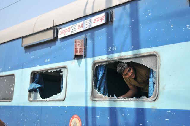 The widow glasses of the AC bogey shattered, leaving passengers rattled. (Pardeep Pandit/HT Photo)
