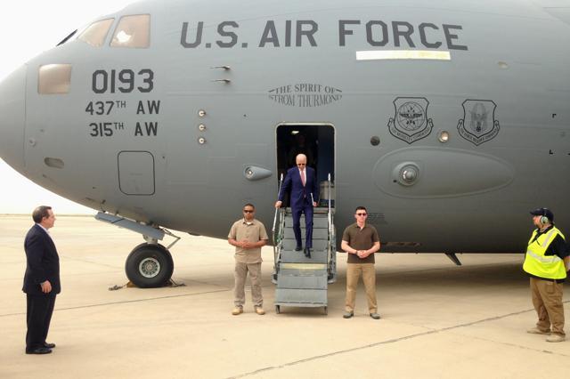 Vice-president Joe Biden steps off a C-17 military transport plane upon his arrival in Baghdad, Iraq, on Thursday. (AP) Vice-president Joe Biden steps off a C-17 military transport plane upon his arrival in Baghdad, Iraq, on Thursday. (AP)