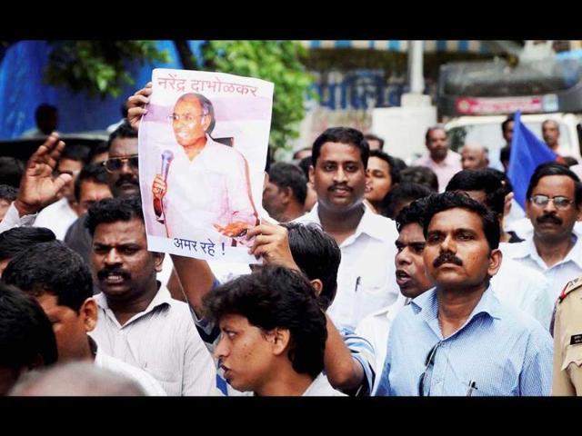 A file photo of a protest demonstration held in Mumbai against the murder of Narendra Dabholkar, an anti-superstition activist who was shot dead in Pune on August 20, 2013. (PTI Photo) A file photo of a protest demonstration held in Mumbai against the murder of Narendra Dabholkar, an anti-superstition activist who was shot dead in Pune on August 20, 2013. (PTI Photo)