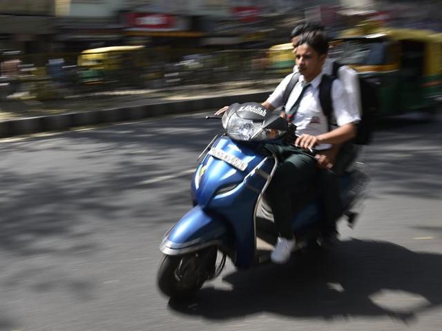 School children Riding scooter at Daryaganj in Delhi. (HT file photo) School children Riding scooter at Daryaganj in Delhi. (HT file photo)
