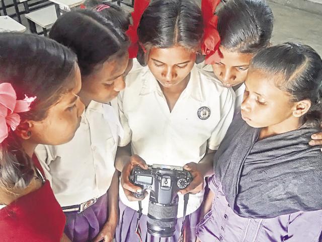 At least 10 girls each from left wing extremism-hit Khunti and Gumla districts, between the age group of 13 to 18 years -- have started undergoing a special training on how to highlight the cases of trafficking in their villages by making films, clicking pictures, writing reports and narrating stories on radios. (HT Photo) At least 10 girls each from left wing extremism-hit Khunti and Gumla districts, between the age group of 13 to 18 years -- have started undergoing a special training on how to highlight the cases of trafficking in their villages by making films, clicking pictures, writing reports and narrating stories on radios. (HT Photo)