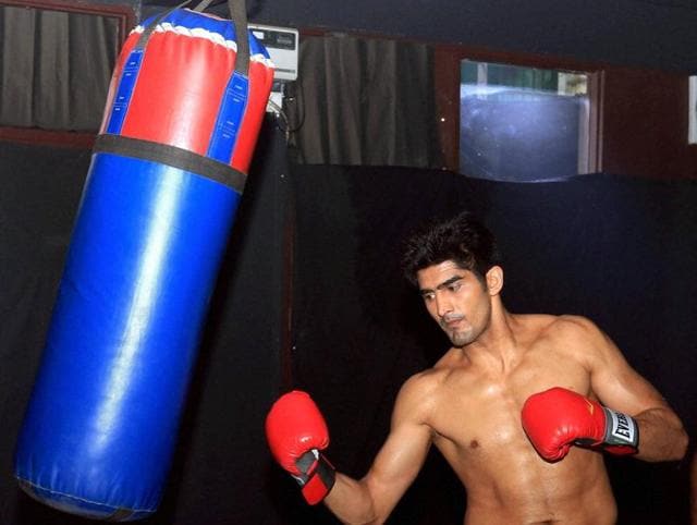 Vijender Singh practices before his next professional boxing bout Matiouze Royer at Manchester Arena, UK on Thursday. (PTI Photo) Vijender Singh practices before his next professional boxing bout Matiouze Royer at Manchester Arena, UK on Thursday. (PTI Photo)