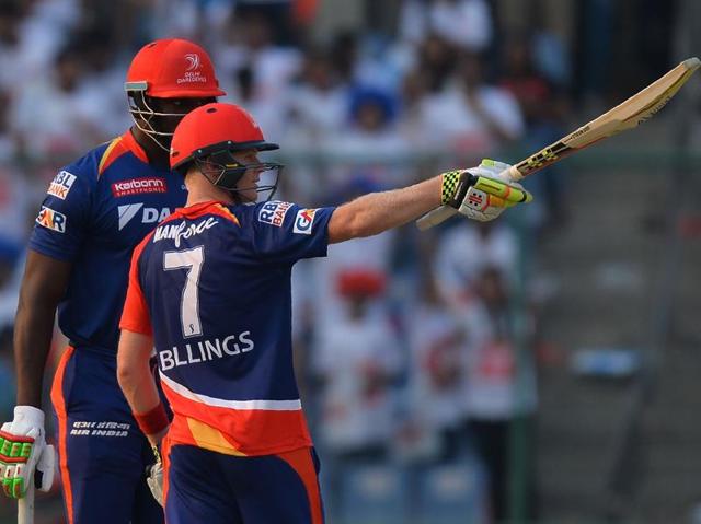 Carlos Brathwaite (L) congratulates Sam Billings(R) as he celebrates his half-century. Billings hit 54 from 34. (AFP)