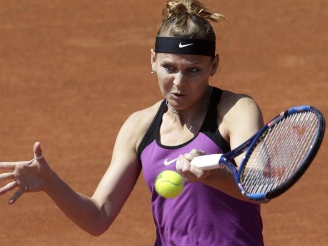 Czech Republic's Lucie Safarova returns a ball to Samantha Stosur from Australia during their final.(AP Photo) Czech Republic's Lucie Safarova returns a ball to Samantha Stosur from Australia during their final.(AP Photo)