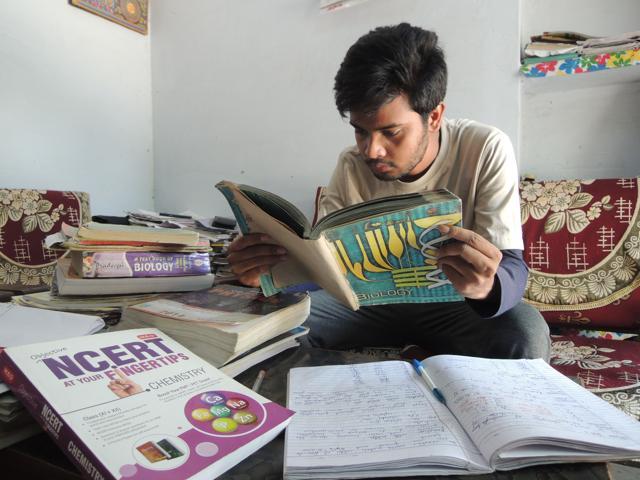 Aspirant Asim Khan preparing for NEET 1 at his residence in Lucknow on Saturday. (Deepak Gupta/ HT photo) Aspirant Asim Khan preparing for NEET 1 at his residence in Lucknow on Saturday. (Deepak Gupta/ HT photo)