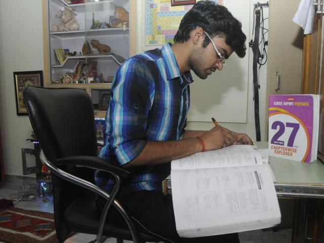 Aspirant Utkarsh Agarwal preparing for NEET 1 at his residence in Lucknow on Saturday. (Deepak Gupta/ HT photo) Aspirant Utkarsh Agarwal preparing for NEET 1 at his residence in Lucknow on Saturday. (Deepak Gupta/ HT photo)