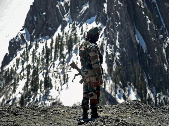 An Indian Army jawan stands guard at Zojila Pass. Reiterating the strategic and economic importance of the highway, Lt Gen Dua said having a throughout-the-year open road is very advantageous for the people and for the forces. (PTI) An Indian Army jawan stands guard at Zojila Pass. Reiterating the strategic and economic importance of the highway, Lt Gen Dua said having a throughout-the-year open road is very advantageous for the people and for the forces. (PTI)