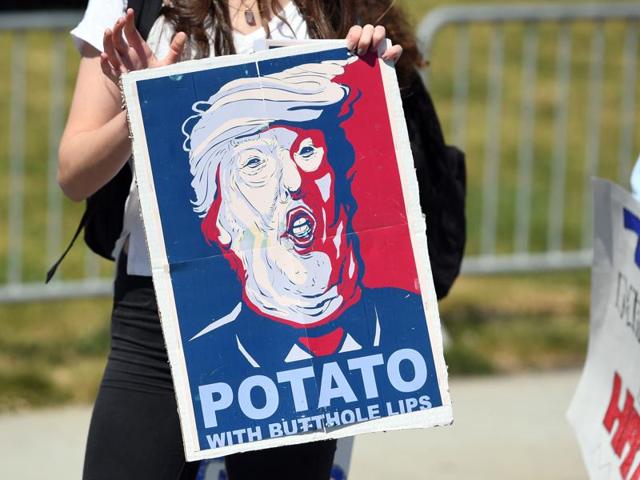 Protesters block a street during an anti-Trump rally outside the Hyatt Regency Hotel where US Republican presidential candidate Donald Trump was speaking in Burlingame, California. (AFP) Protesters block a street during an anti-Trump rally outside the Hyatt Regency Hotel where US Republican presidential candidate Donald Trump was speaking in Burlingame, California. (AFP)