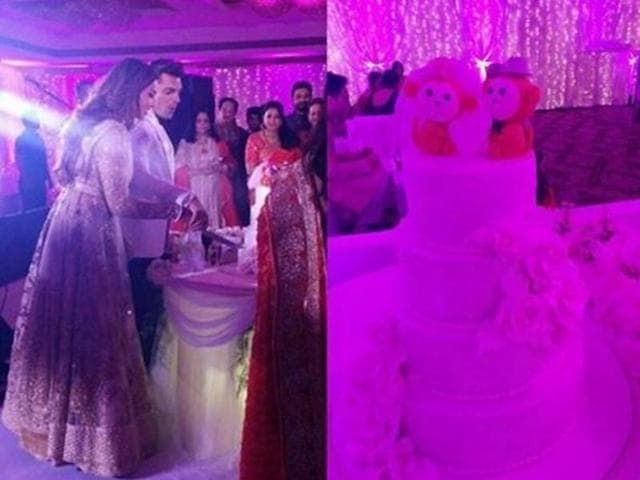 The white-themed reception, held in a South Mumbai hotel, saw the couple cut their white-and-pink wedding cake, which had two monkeys made on it as they lovingly address each other as “monkey”. (Instagram) 