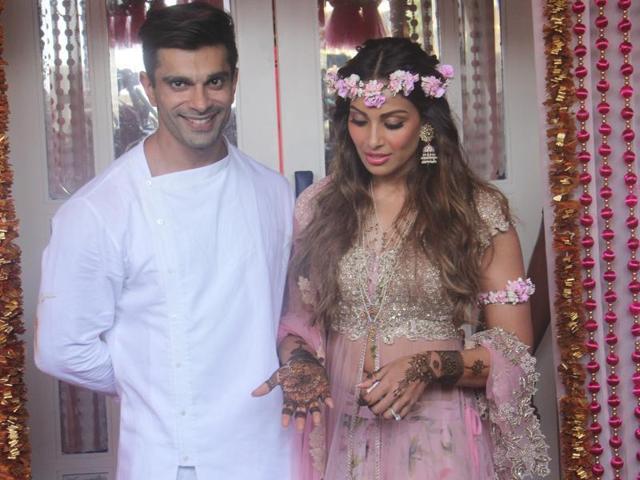 Karan Singh Grover with his beautiful bride Bipasha Basu during their mehendi ceremony on Friday in Mumbai. (HT Photo) Karan Singh Grover with his beautiful bride Bipasha Basu during their mehendi ceremony on Friday in Mumbai. (HT Photo)