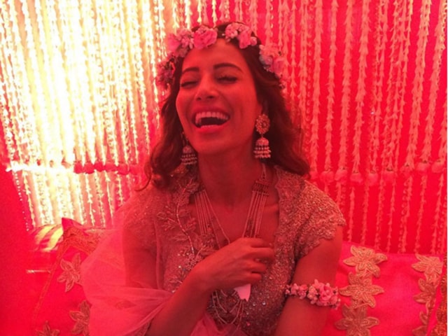 Happy, carefree and decked in flowers, Bipasha Basu was a vision at her mehendi ceremony. All you bridezillas, here’s to all new wedding day goals.  (Instagram) 