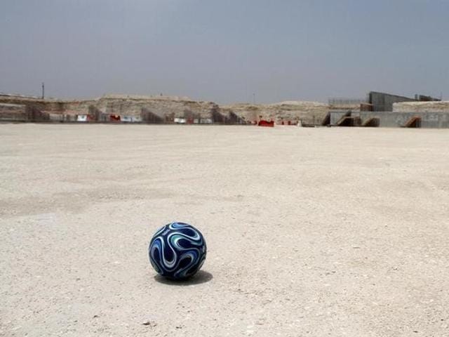 A football is seen at the construction site of Al Wakrah stadium, that is expected to host football matches during the 2022 World Cup. (Reuters) A football is seen at the construction site of Al Wakrah stadium, that is expected to host football matches during the 2022 World Cup. (Reuters)