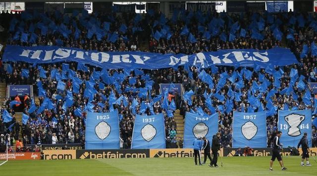 Leicester fans hold up banners during a match. (Reuters Photo)