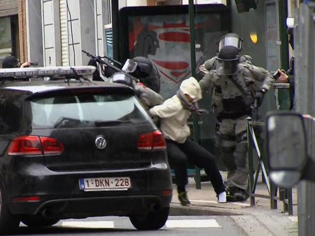 In this Friday March 18, 2016 file framegrab taken from VTM, Salah Abdeslam, centre, is arrested by police and bundled into a police vehicle during a raid in the Molenbeek neighborhood of Brussels, Belgium. (AP) In this Friday March 18, 2016 file framegrab taken from VTM, Salah Abdeslam, centre, is arrested by police and bundled into a police vehicle during a raid in the Molenbeek neighborhood of Brussels, Belgium. (AP)