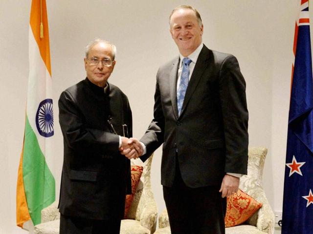 President Pranab Mukherjee shakes hands with John Key, Prime Minister of New Zealand during a signing of agreement on direct flight service between the two countries. (PTI) President Pranab Mukherjee shakes hands with John Key, Prime Minister of New Zealand during a signing of agreement on direct flight service between the two countries. (PTI)