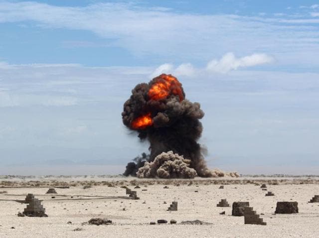Smoke and fire billow from the desert of al Alam, east of the southern port city of Aden during a controlled explosion by Yemeni security forces to destroy explosives and mines laid by the al Qaeda. (AFP Photo) Smoke and fire billow from the desert of al Alam, east of the southern port city of Aden during a controlled explosion by Yemeni security forces to destroy explosives and mines laid by the al Qaeda. (AFP Photo)