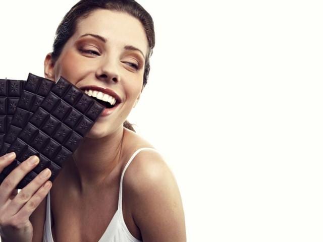 Dark chocolate provides similar benefits to beetroot juice, taken regularly by elite athletes after studies showed it can improve performance.(Shutterstock)